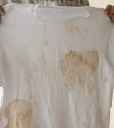 [freepicdownloader.com]-stained-white-tshirt-that-features-noticeable-marks-unpleasant-blemishes-it-large